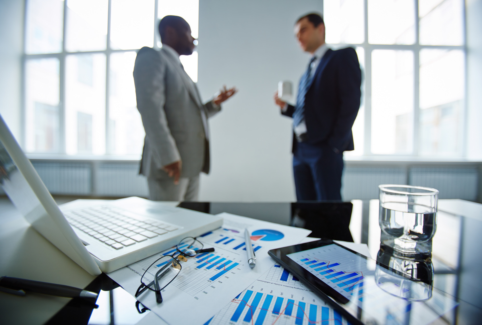 Two men discussing financial issues