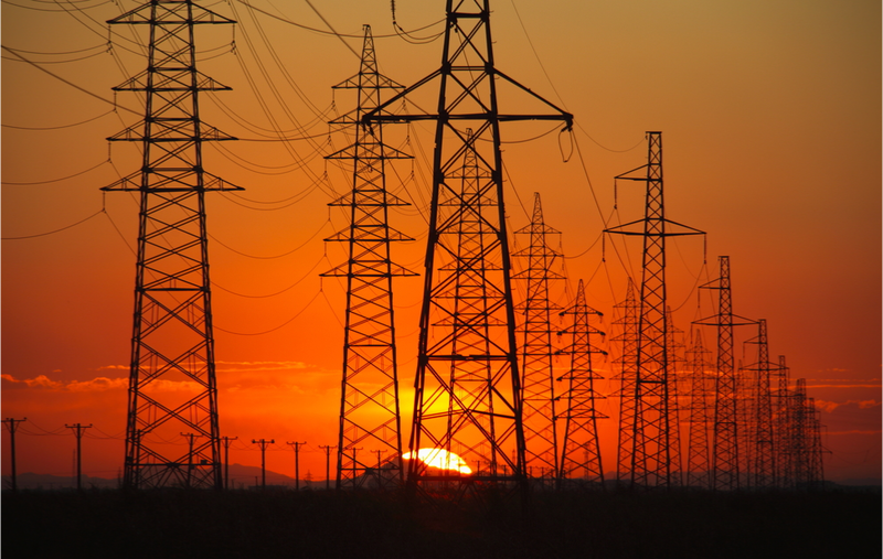 Transmission lines at sunset